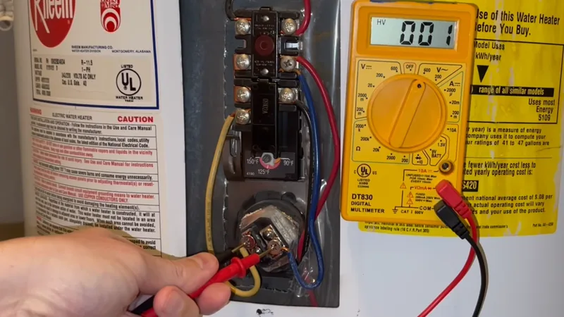 Water heater technician testing a thermostat with a digital multimeter during a water heater repair in Everett MA